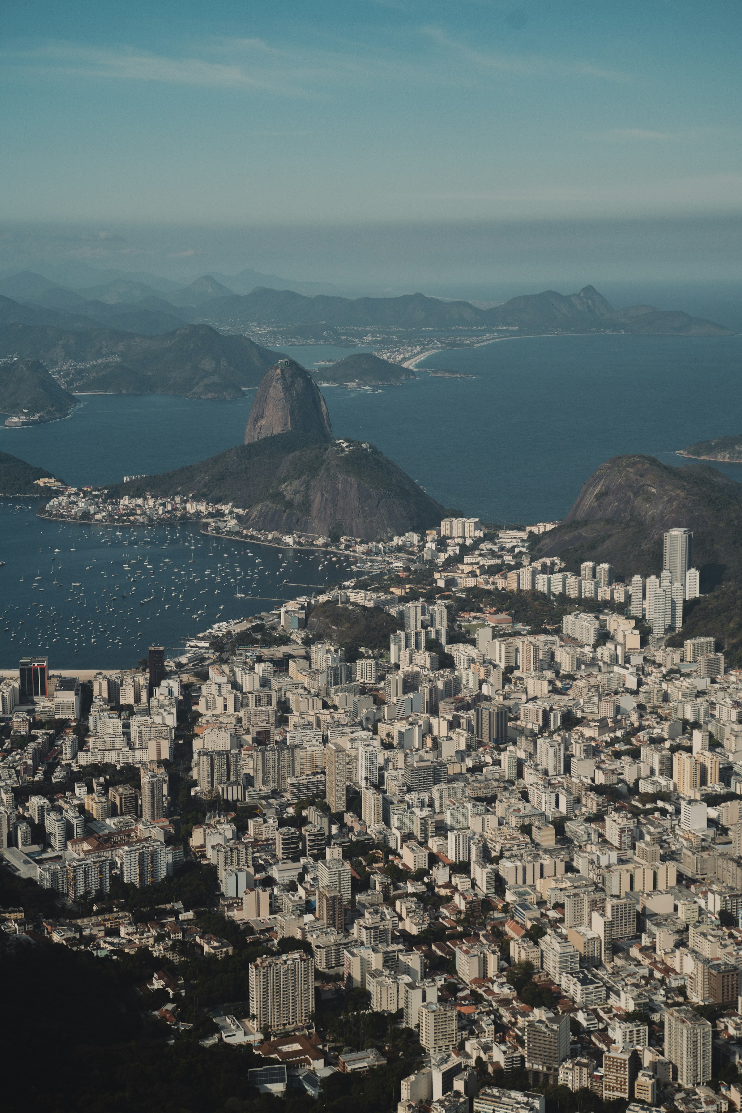 Aerial view of Rio de Janeiro and Guanabara Bay with Sugarloaf Mountain at dusk